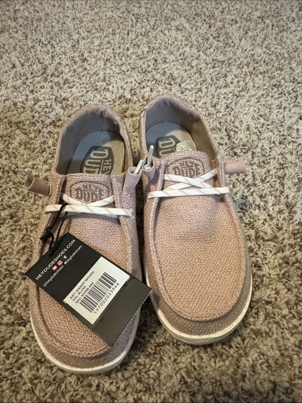 Hey Dude women’s Wendy woven  Lo Slip-On Shoes in Blush.